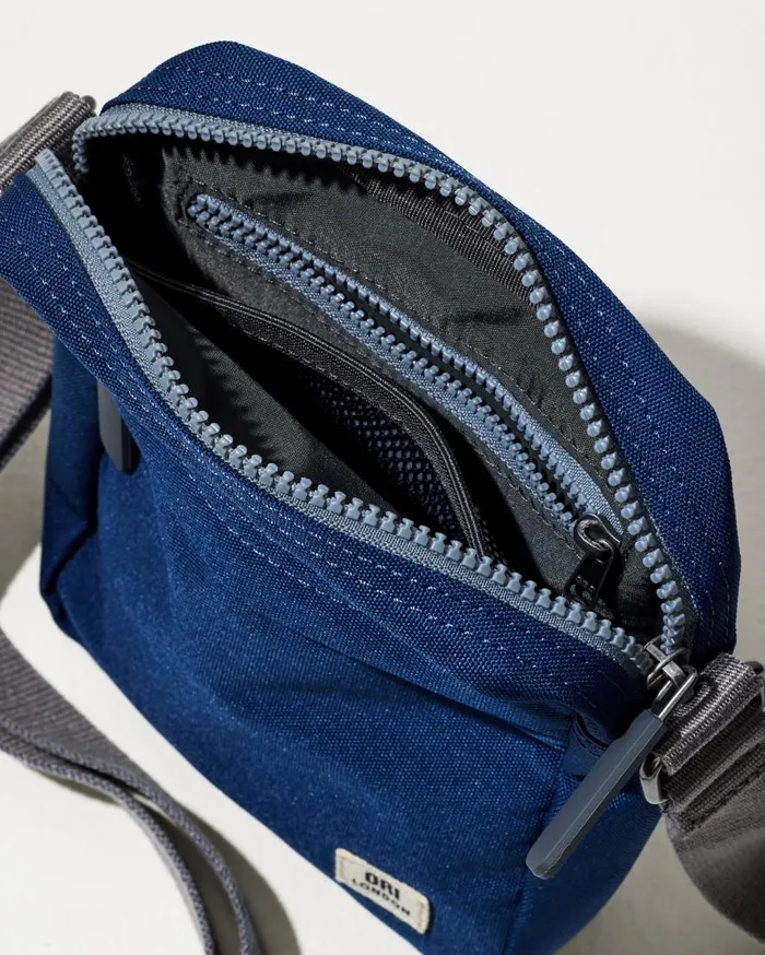 Tommy Bahama Luggage and Travel Bond Deep Blue Canvas Crossbody Deep Blue 8211 Beach and HomeMen Tommy Bahama Luggage and Travel Bond Deep Blue Canvas Crossbody Deep Blue 8211 Beach and HomeMen