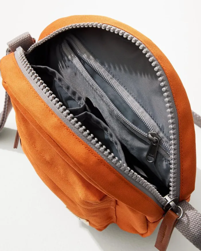 Tommy Bahama Luggage and Travel Paddington Atomic Orange Crossbody Bag Atomic Orange 8211 Beach and HomeMen Tommy Bahama Luggage and Travel Paddington Atomic Orange Crossbody Bag Atomic Orange 8211 Beach and HomeMen